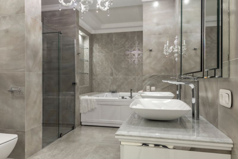 bathroom tile renovation - 1 Grey Tiled Floor and Walls
